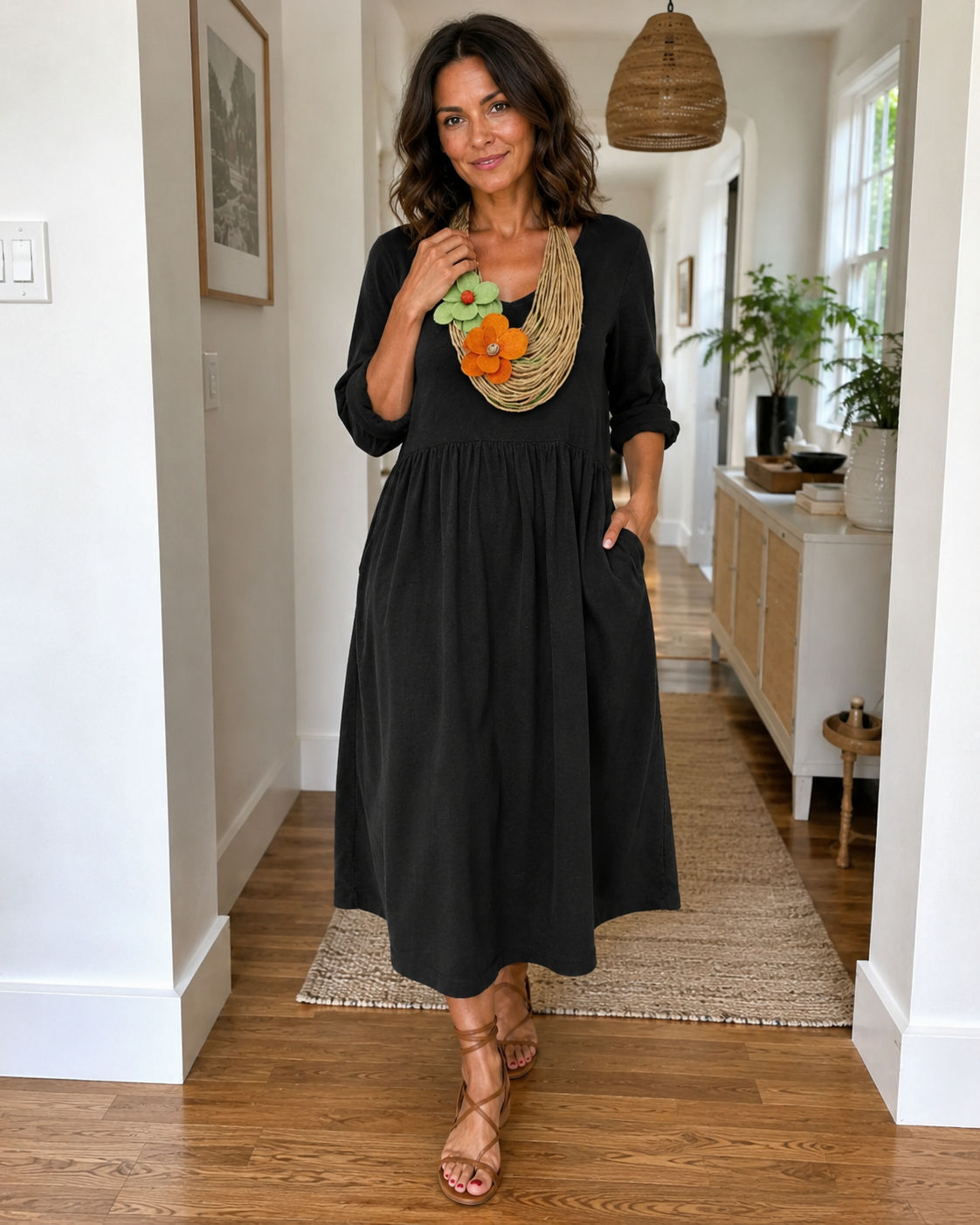 Vestido longo de linho com gola redonda e bolsos