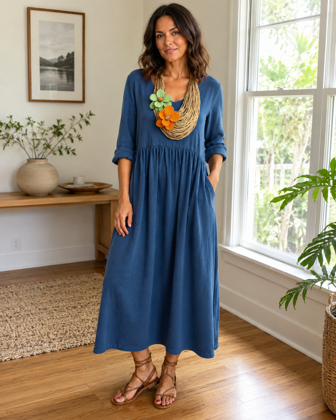 Vestido longo de linho com gola redonda e bolsos