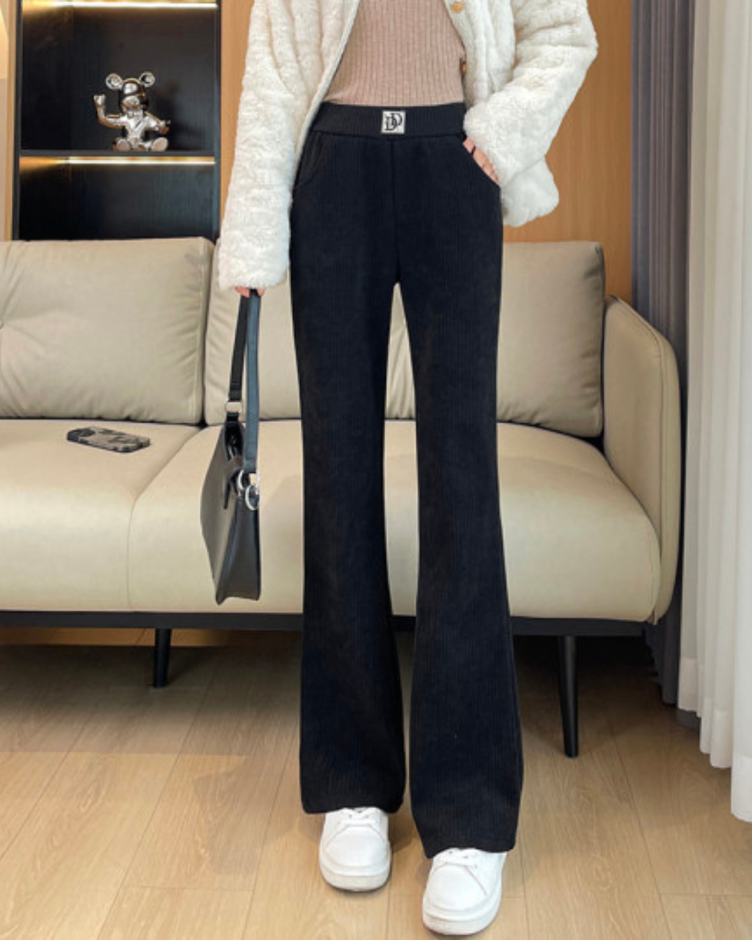 Calças às riscas com forro polar de perna larga